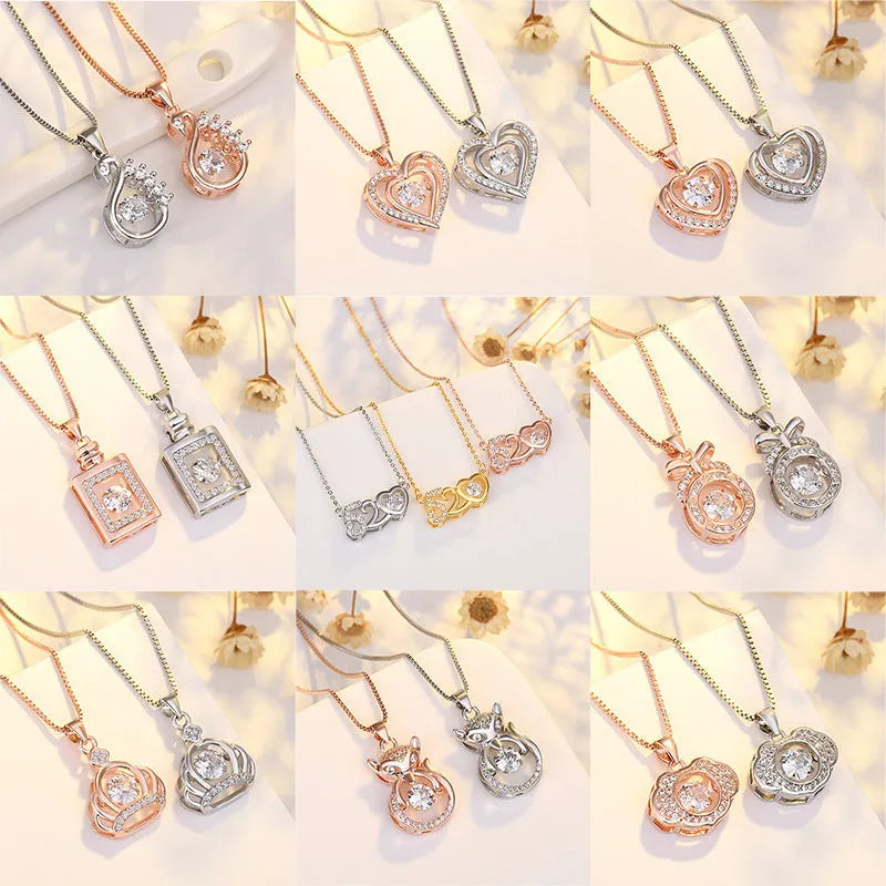 Close-up of a women's silver heart necklace pendant featuring a crown and bow design on a chain.