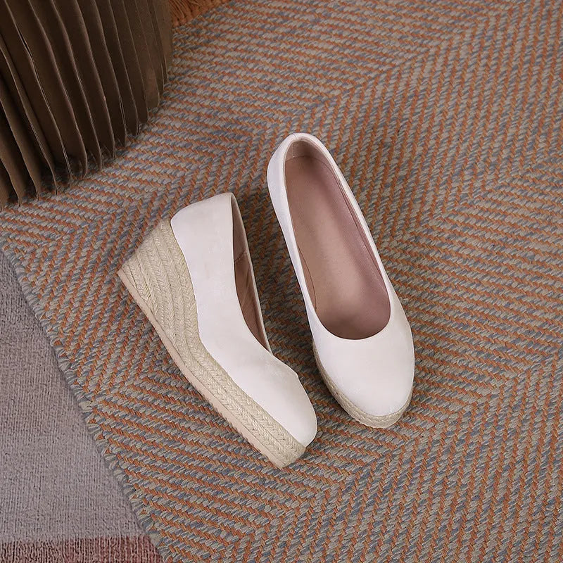 Women's wedge high heel pumps in apricot with rope-textured sole and shallow mouth design.