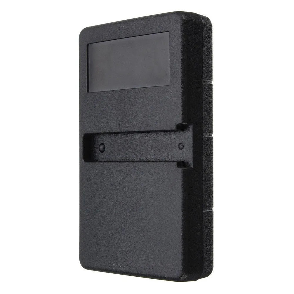 Black three-button garage door remote control with keyring loop next to a CR2032 battery.
