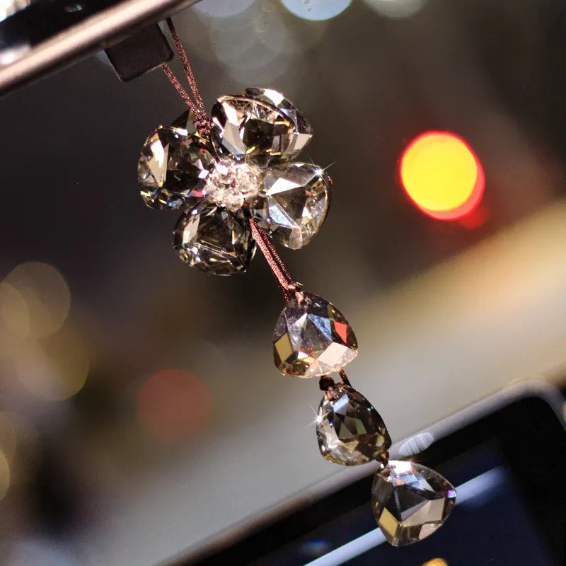Crystal four leaf grass car pendant in four colour options hanging from rearview mirror