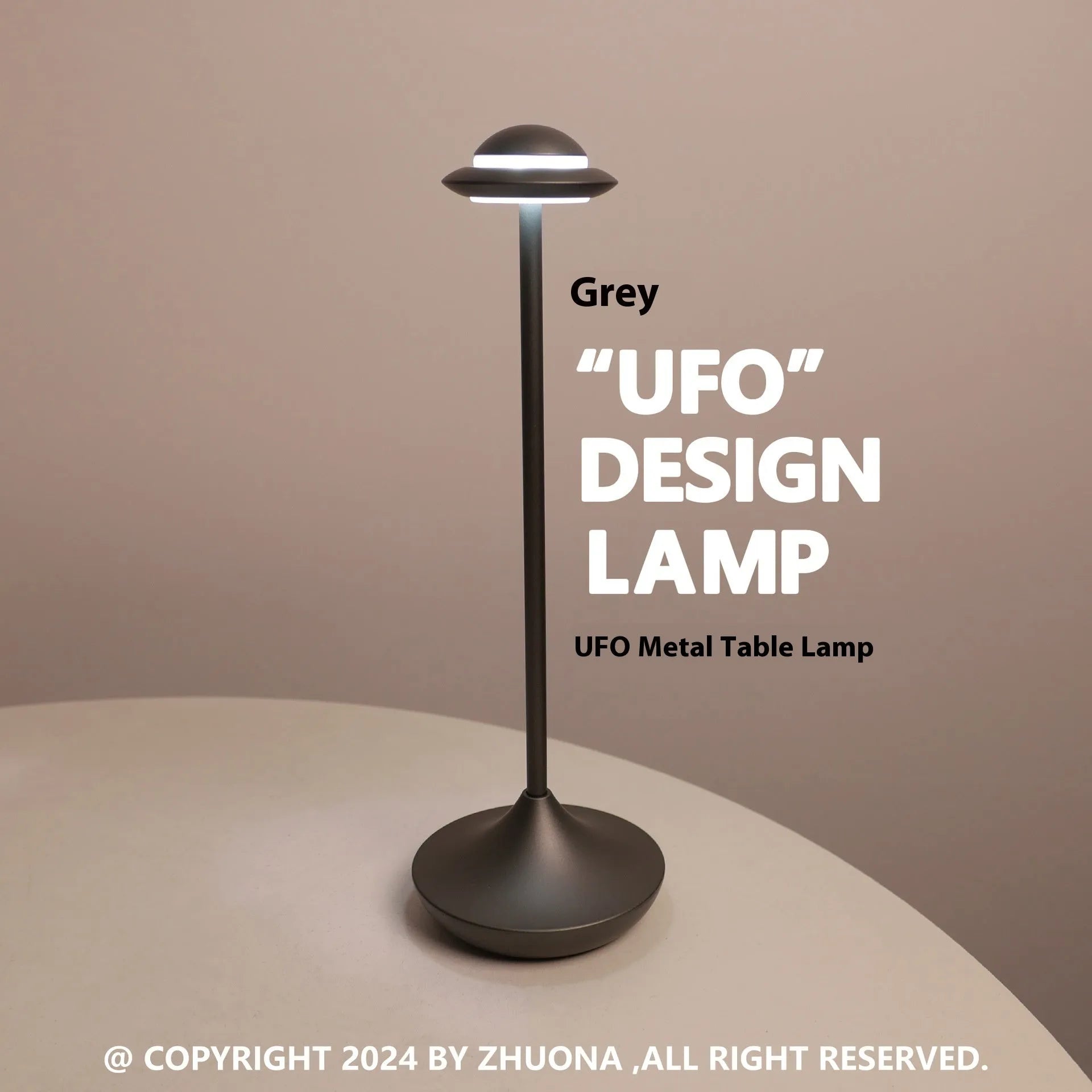 Gold UFO-shaped metal desk lamp with touch controls on creative rechargeable LED lamp