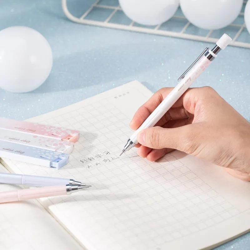 Cartoon automatic pencil set with three pens and HB refill boxes in Sakura law design