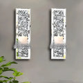 Pair of silver mirror glass wall candle holders measuring 10x11x38cm