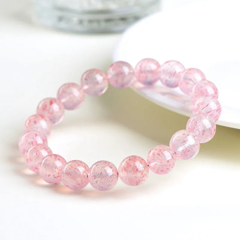 Strawberry quartz crystal bracelet with geometric 10-10.8mm beads