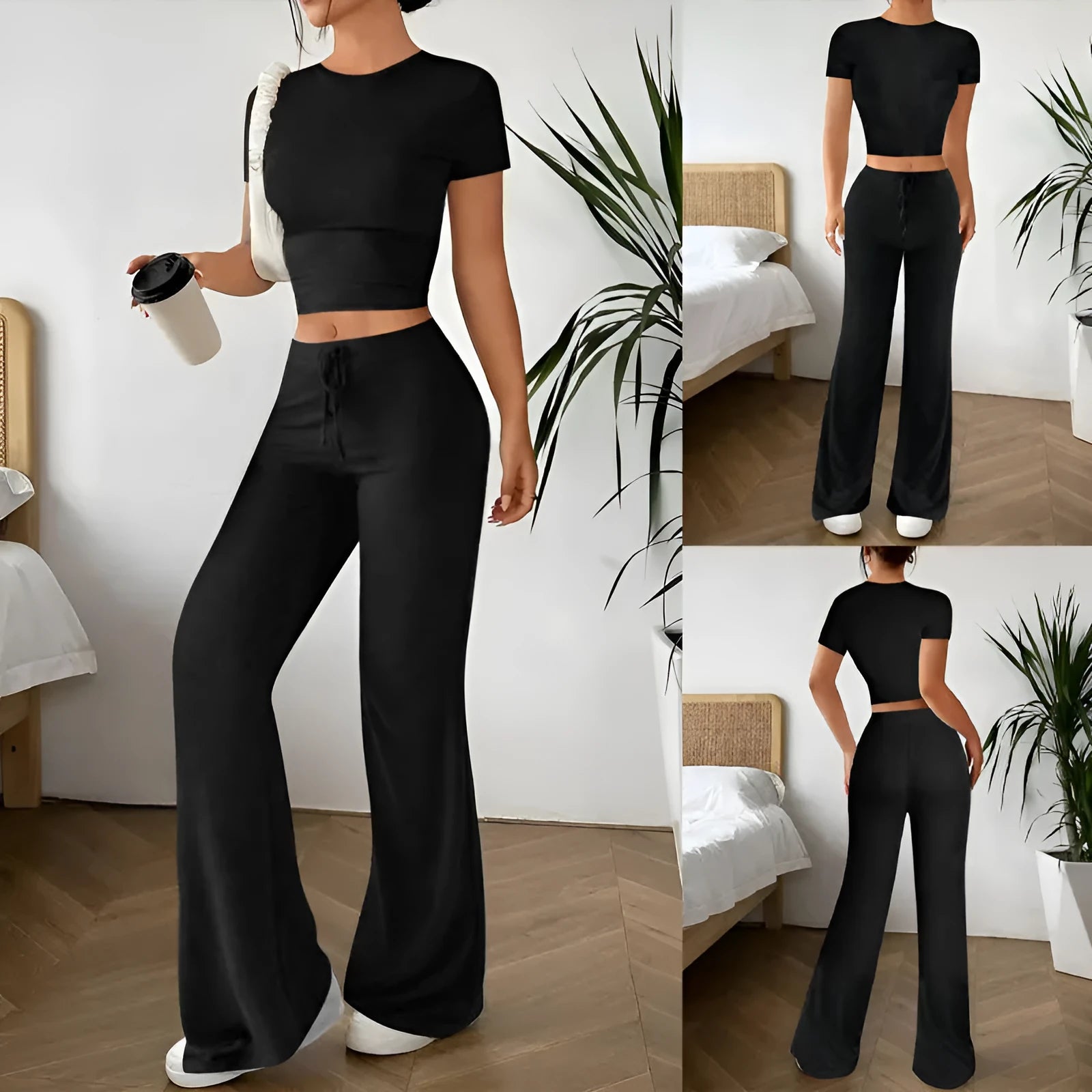 Black women's high waist trouser and short sleeve t-shirt co-ord set on a hanger.