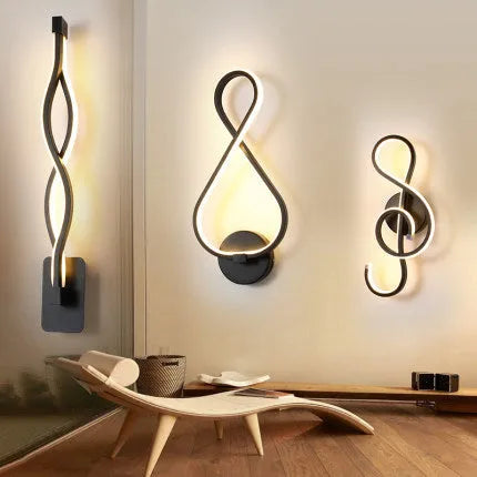 Nordic minimalist LED wall lamp with silicone shade in black finish mounted beside bed