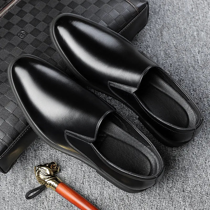 Men's black business casual slip-on shoes with renewable leather upper and rubber sole
