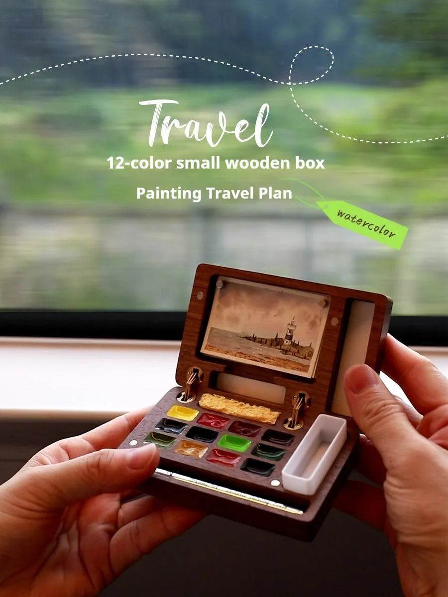 Miniature walnut wood watercolour box with brass fittings and professional paint tubes in leather case