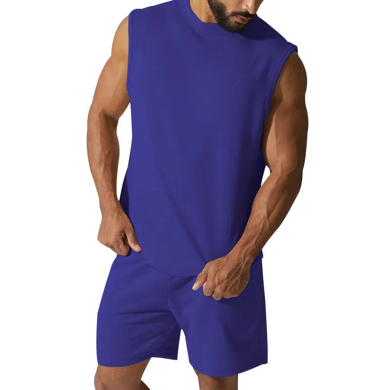 Men's sleeveless cotton blend sports suit showing top and shorts in a solid colour.