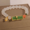 White agate jasper bracelet with a natural jade bead and bamboo joint design