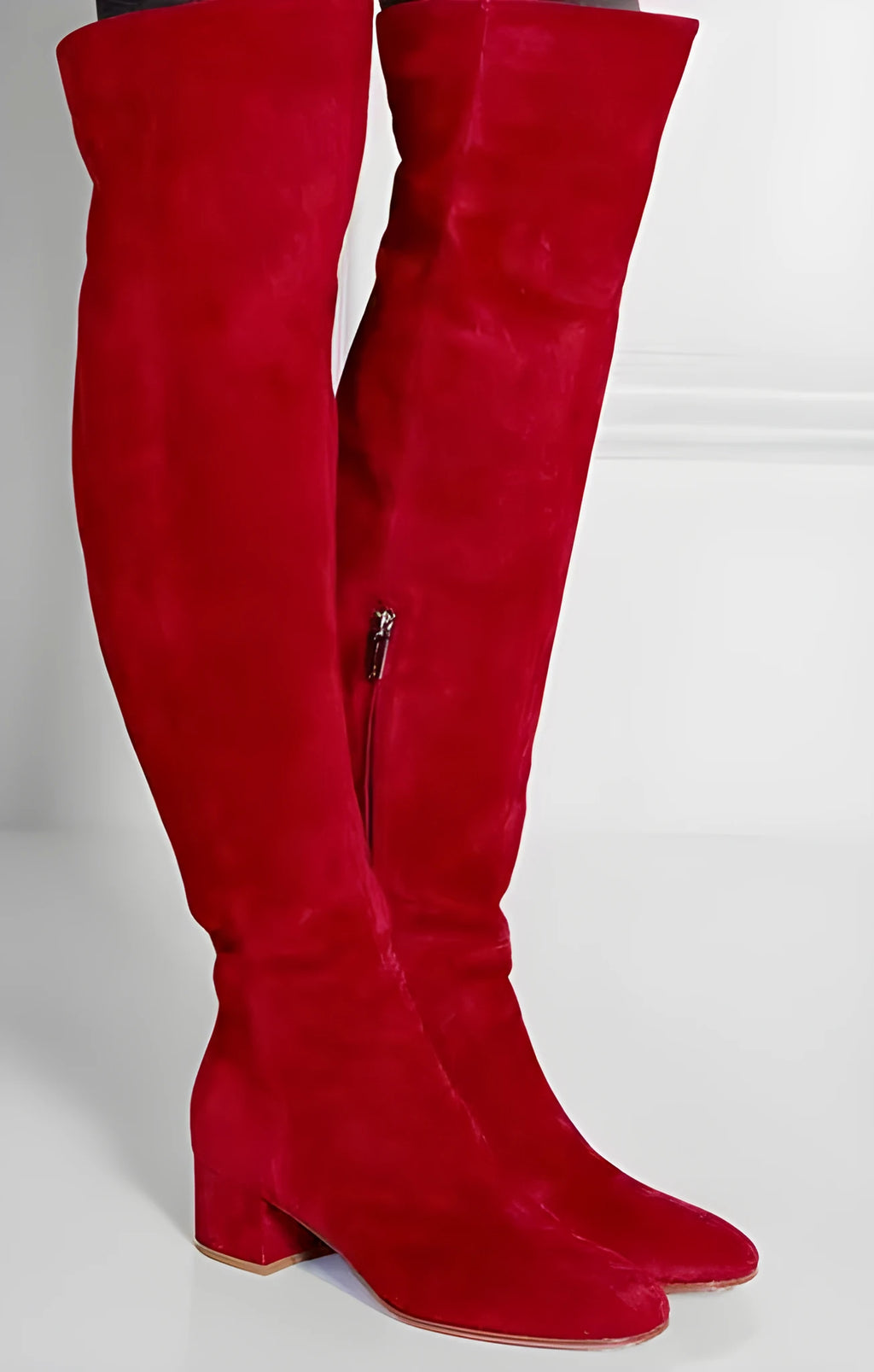 Grey suede women's over-the-knee flat boots with a low chunky heel and pointed toe.