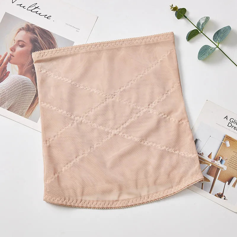 Mesh belly band waist trimming strap in black or skin colour with cross waistband design
