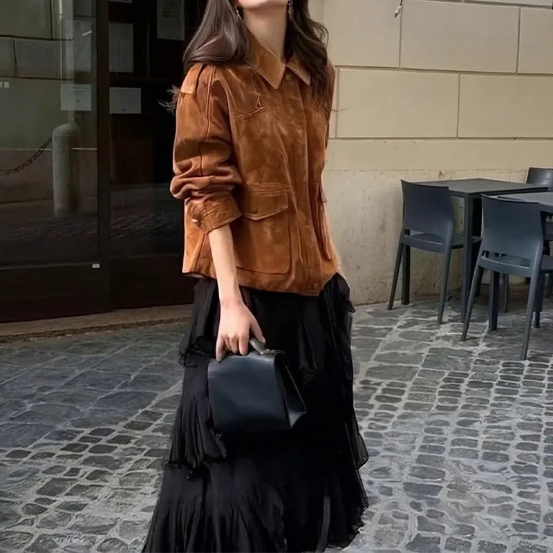 Women's suede-look polyester coat in bright brown colour with regular sleeves on mannequin