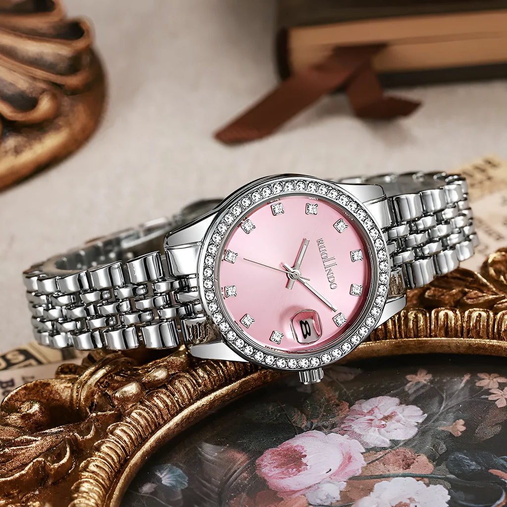 Women's silver calendar watch with 32mm dial, quartz movement, and stainless steel buckle.