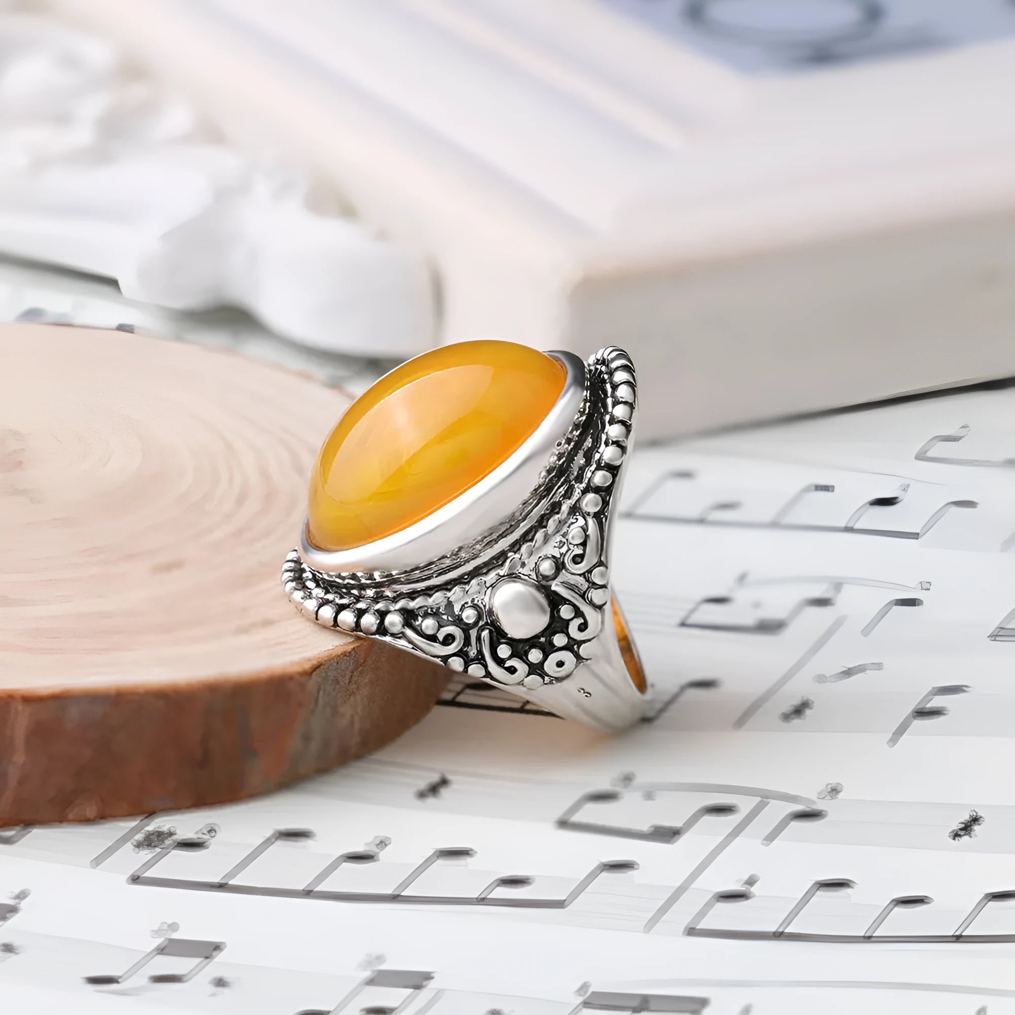 Retro geometric alloy ring with fluorescent beeswax plating in antique silver amber colour.