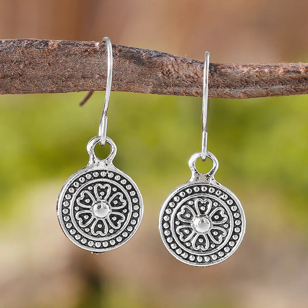 Women's bohemian retro earrings with distressed ethnic round print design in geometric shape