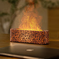 Square black and white USB lava flame aroma diffuser humidifier on a desktop