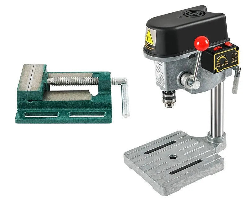 Mini bench drill and milling machine with included 1050W drill and metal bench pliers on a workbench.