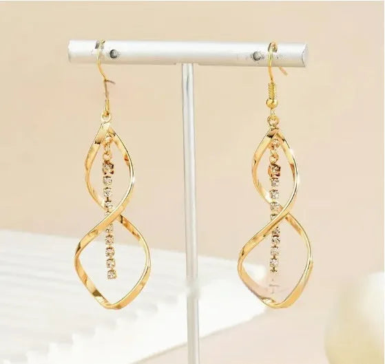 Geometric spiral design gold electroplated alloy earrings with elliptical shape