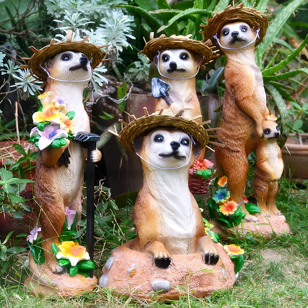 Straw hat wearing mongoose garden ornament in synthetic resin