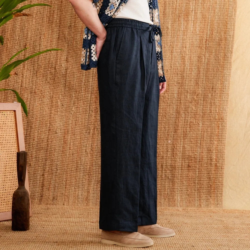 Women's straight-leg linen trousers in greige with an elasticated high waistband.