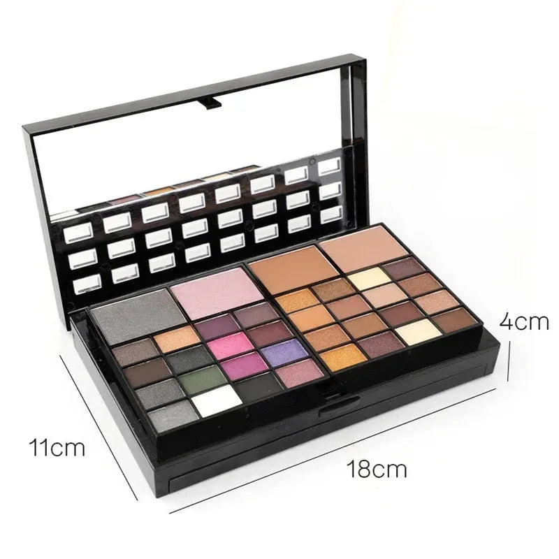 74 colour makeup palette open showing eyeshadow, lip gloss, blush and contour powders with brush and applicator