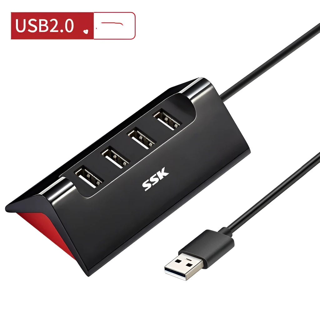 Black USB expansion dock with four ports, compact rectangular design, and a Micro USB power cable.