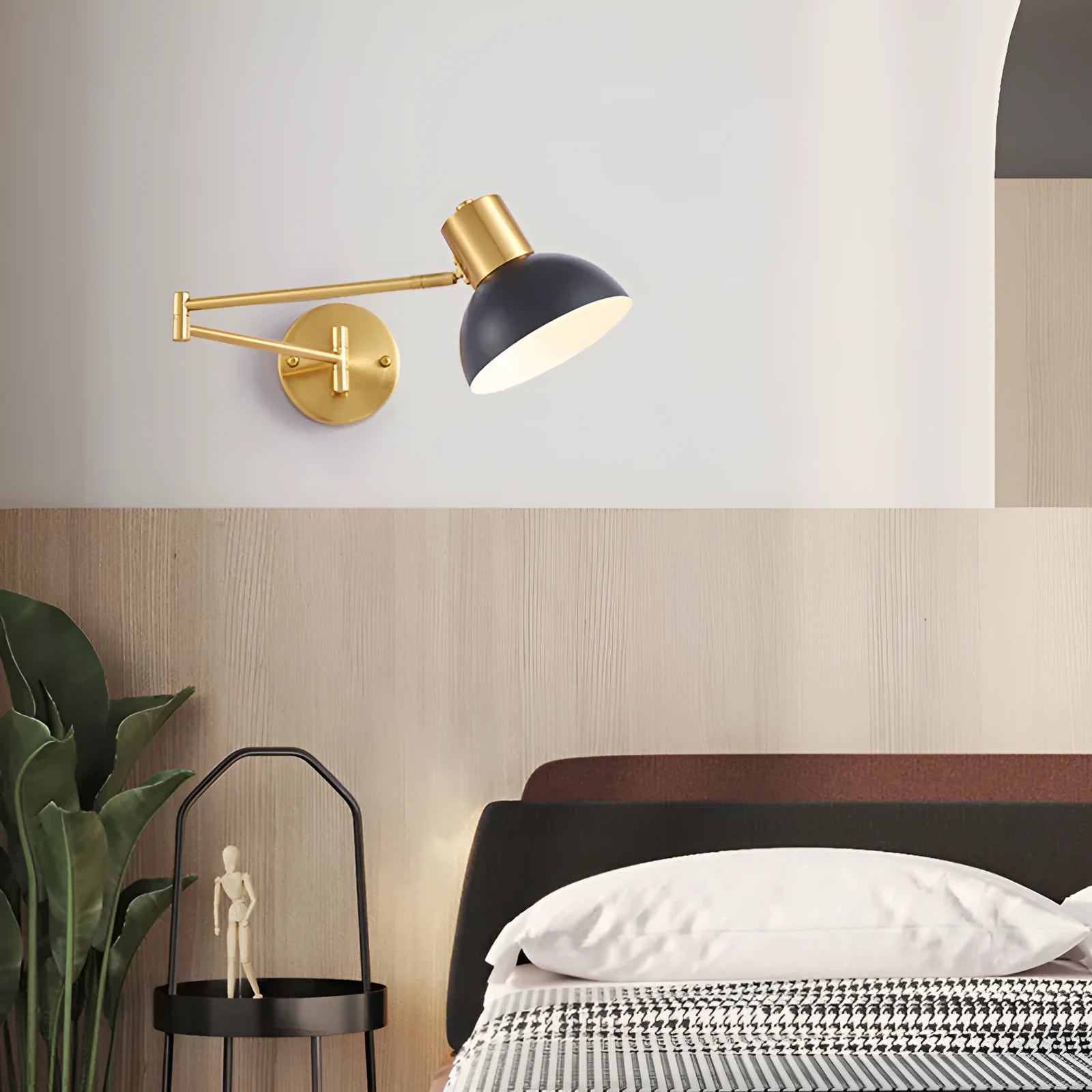 Modern double-section rocker arm wall lamp in a minimalist style mounted on a wall.