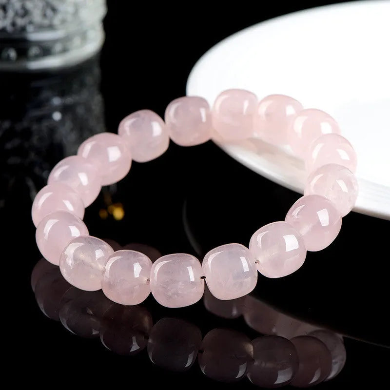 Pink crystal barrel bead bracelet with 11-12mm geometric beads and original design