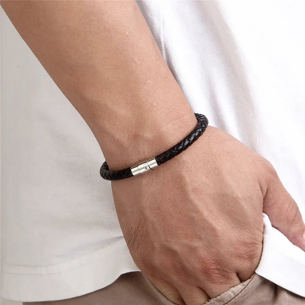 Geometric titanium steel wire bracelet with a magnetic clasp, shown in a unisex style.