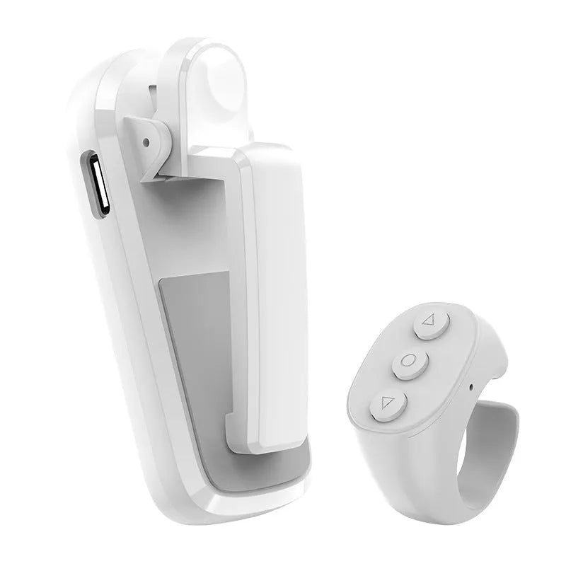 Smart wireless page turner remote control with clicker accessory in black, white, or pink colour.
