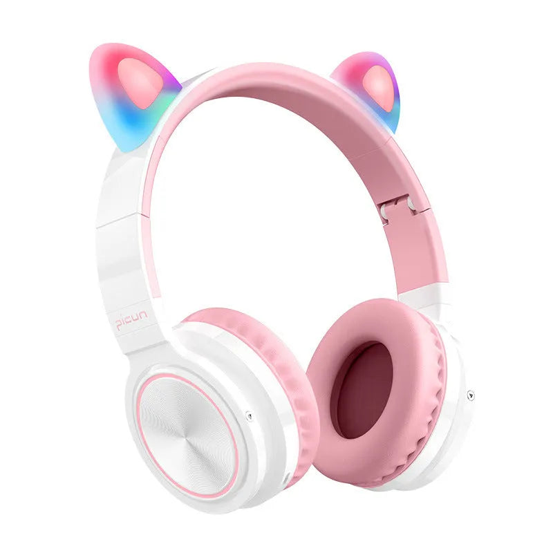 Pink white Luminous Bluetooth over-ear headphones showing protein ear cushions and braided cable.