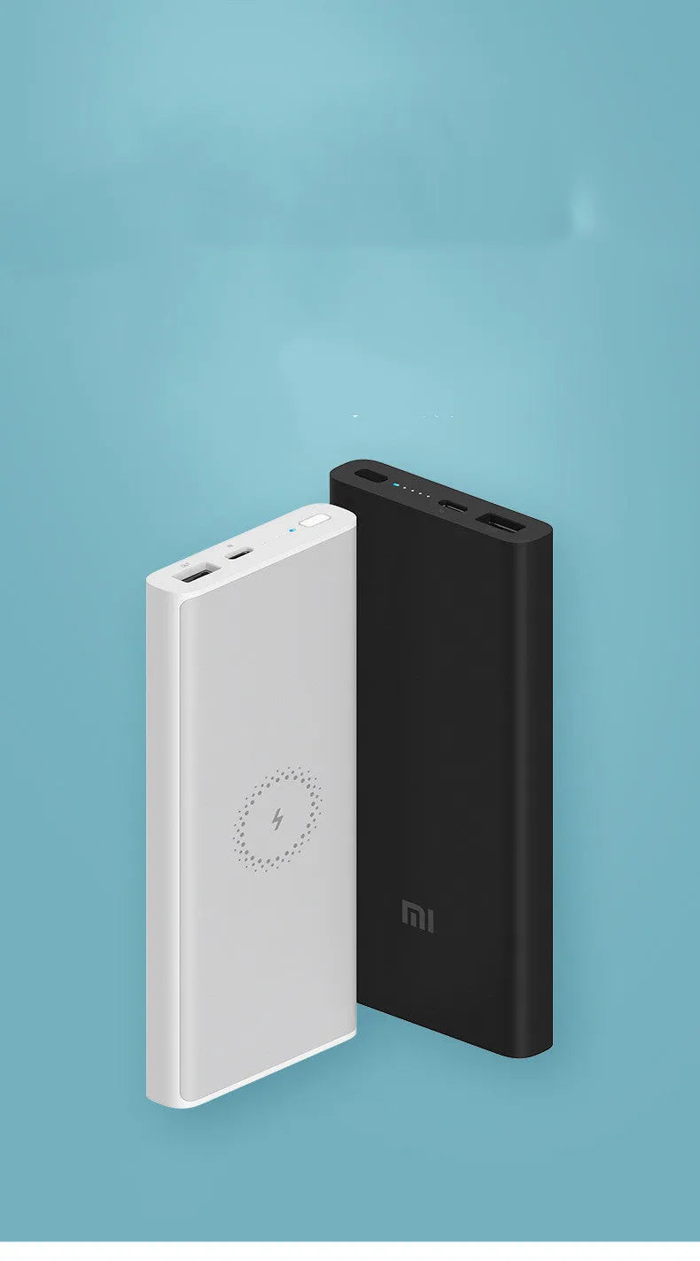 Black and white 10000 mAh power bank with USB Type-C port and wireless charging surface.