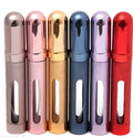Slim 12ml aluminium travel perfume bottle in six colour options: blue, gold, pink, red, silver, violet.