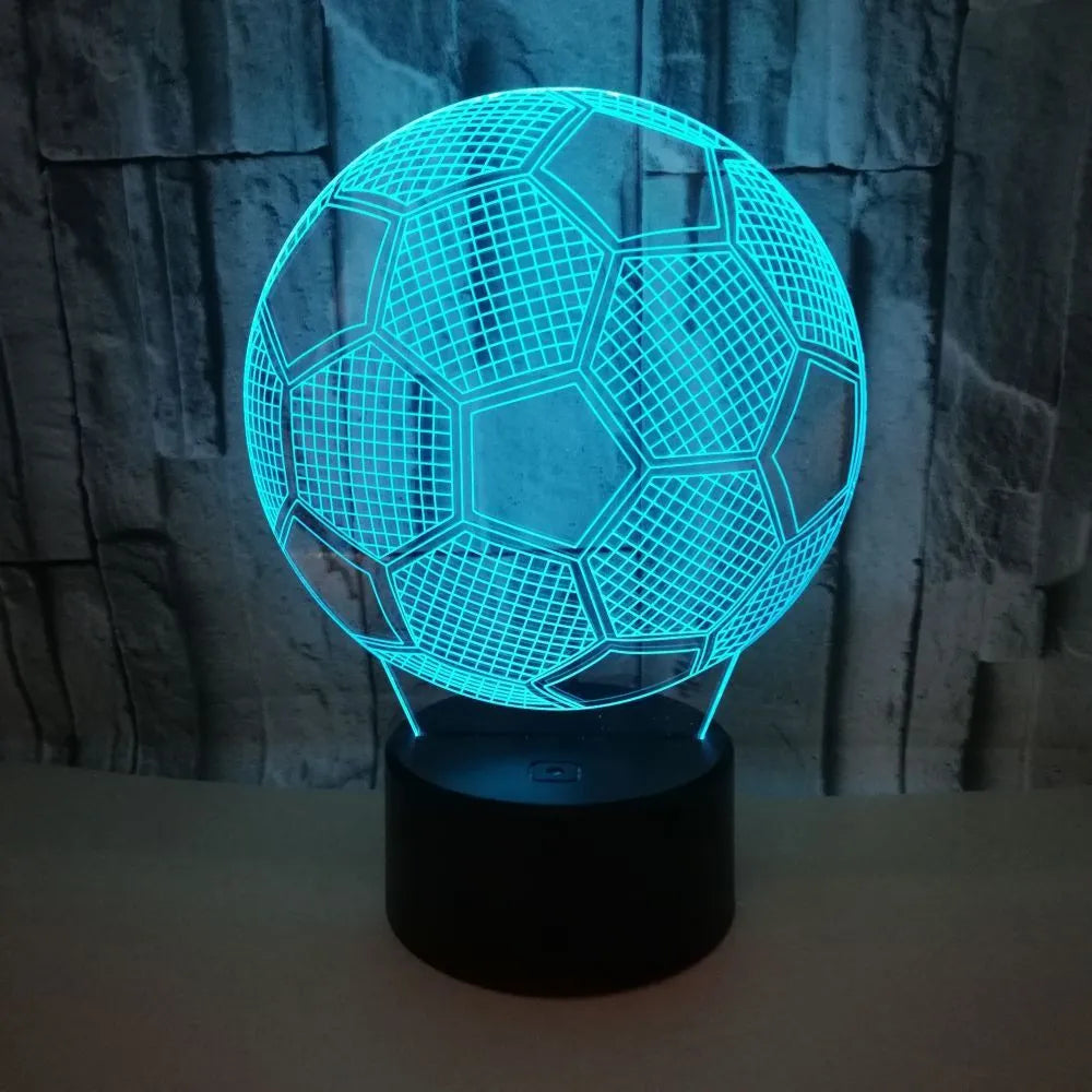 3D football shaped night light with colour changing LED display and remote control on acrylic base