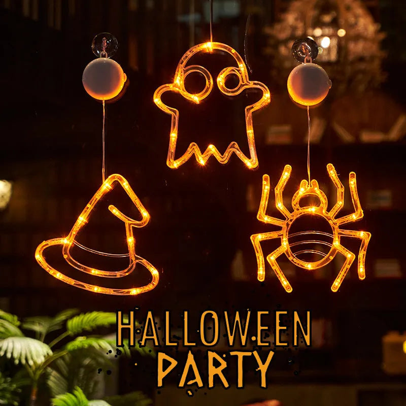 Halloween window hanging LED lights 7-piece set with spider pumpkin ghost designs on display