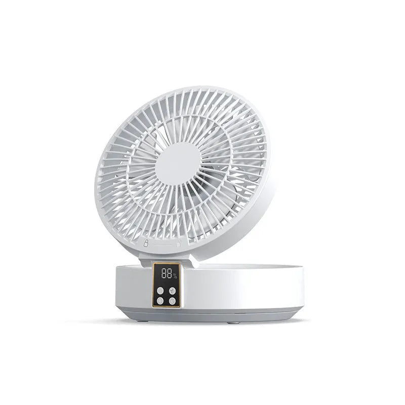 White rechargeable folding USB ceiling fan with remote control on wooden desk