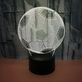 3D football shaped night light with colour changing LED display and remote control on acrylic base