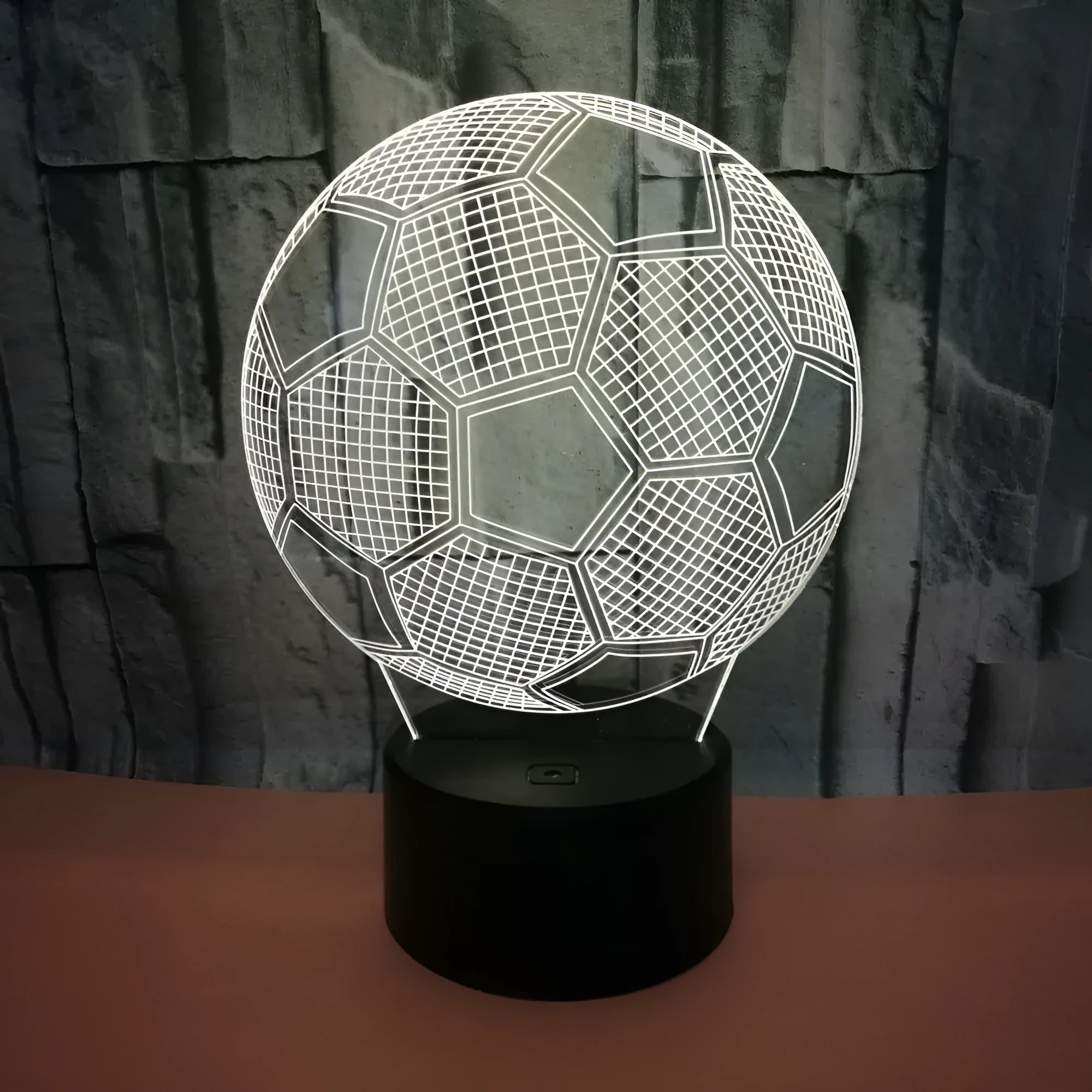 3D football shaped night light with colour changing LED display and remote control on acrylic base