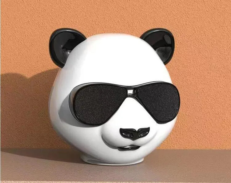 Portable mini classic style Bluetooth speaker with USB port for charging.