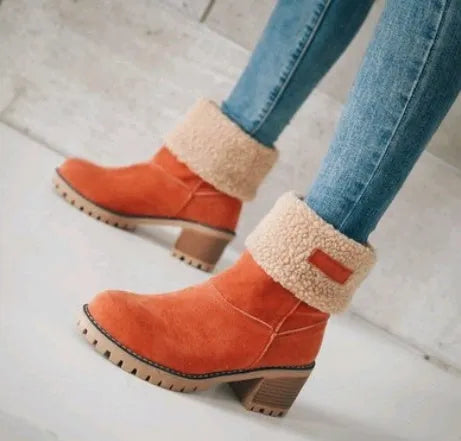 Women's suede mid-calf snow boot in grey with a flat heel and round toe.