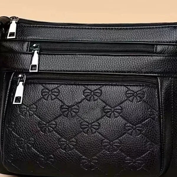 Butterfly black PU leather shoulder messenger bag with horizontal square shape and crossbody strap