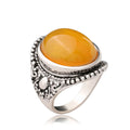 Retro geometric alloy ring with fluorescent beeswax plating in antique silver amber colour.