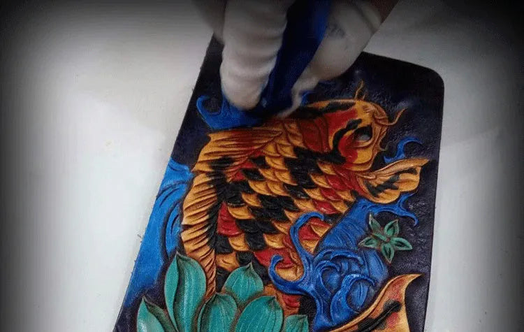 Men's handcrafted cow leather short wallet in red, blue, and gold colours showing compact size.