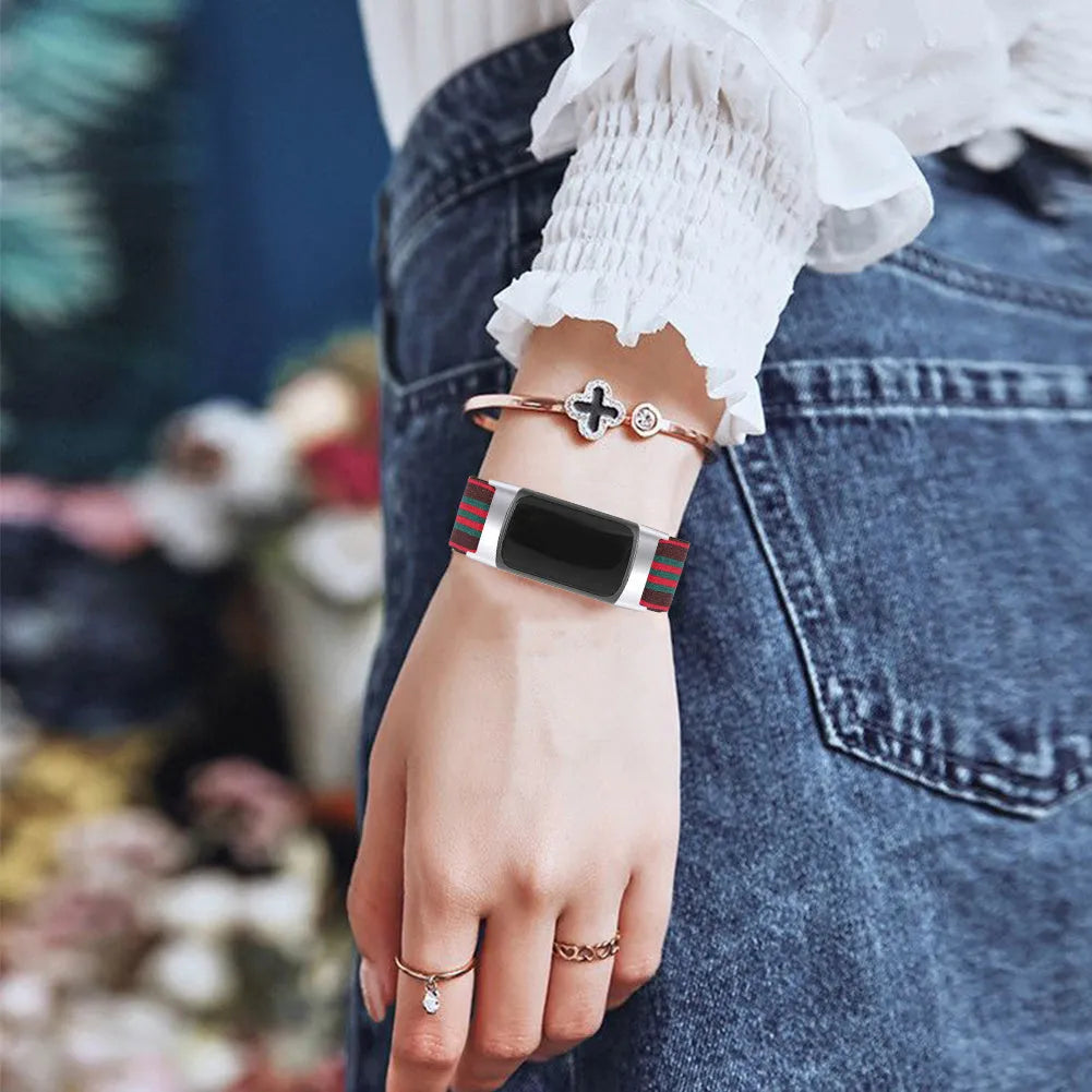 Printed elastic watch strap for Fitbit Charge 6 showing adjustable length and colourful pattern options