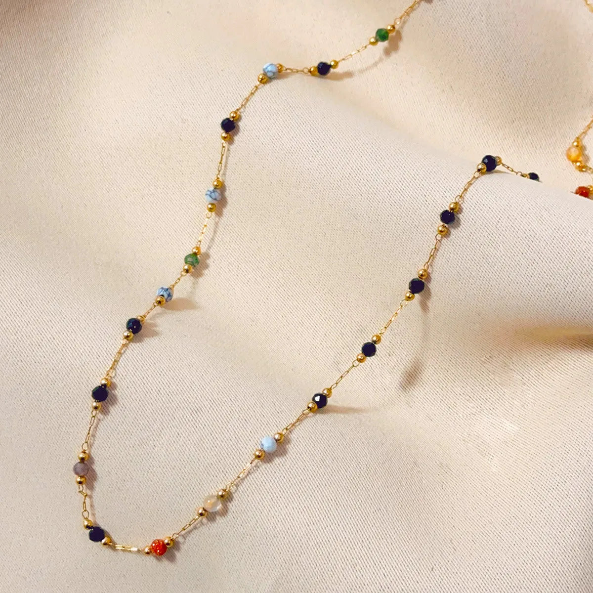 Gold electroplated titanium steel women's necklace with natural stone pendant on O-ring chain