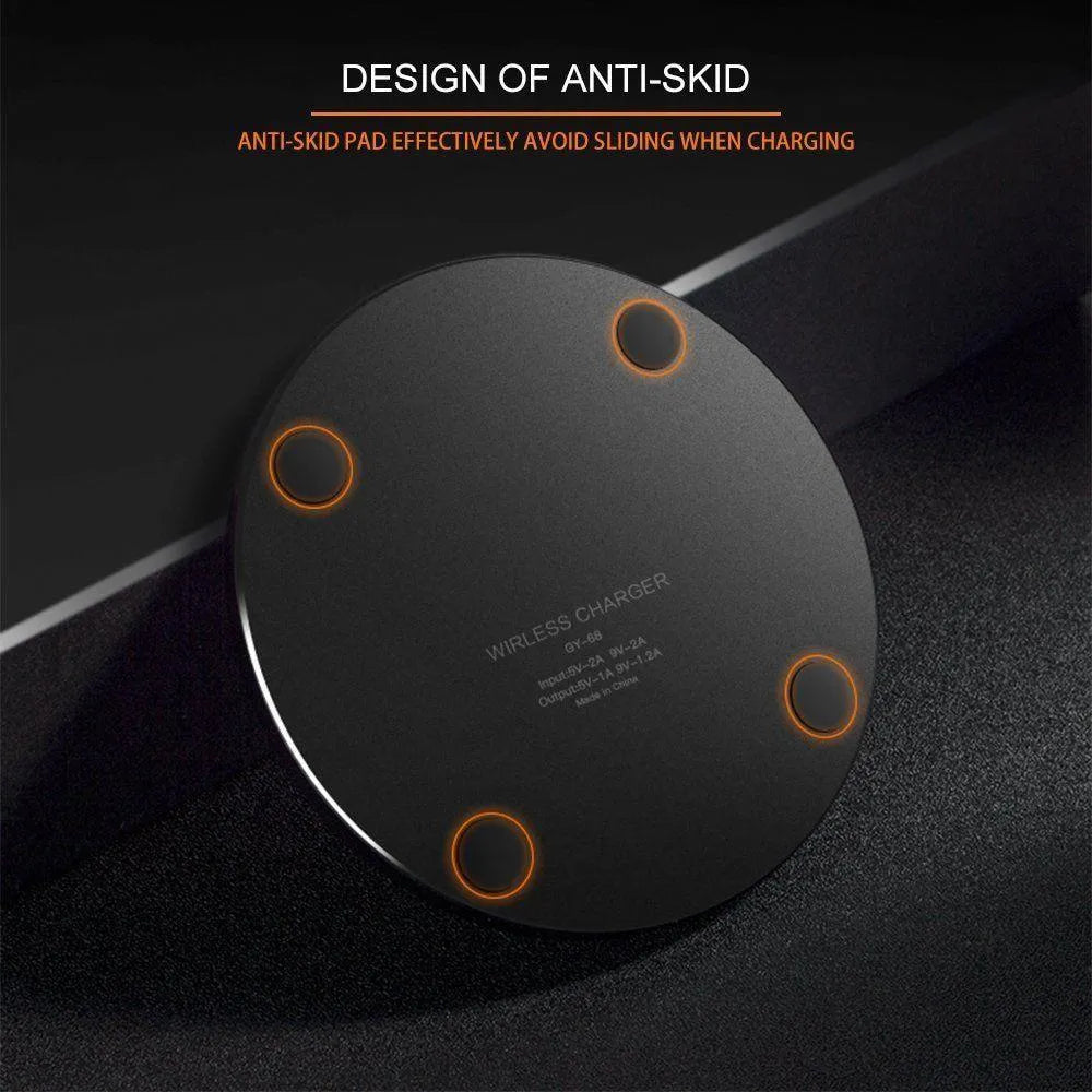 Black square GY-68 ultra-thin wireless fast charging pad on a desk.