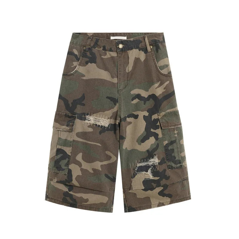 Men's camouflage cropped jeans with patchwork and ripped details in loose straight cut