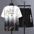 Men's light grey summer suit consisting of a short sleeve T-shirt and matching shorts on a hanger