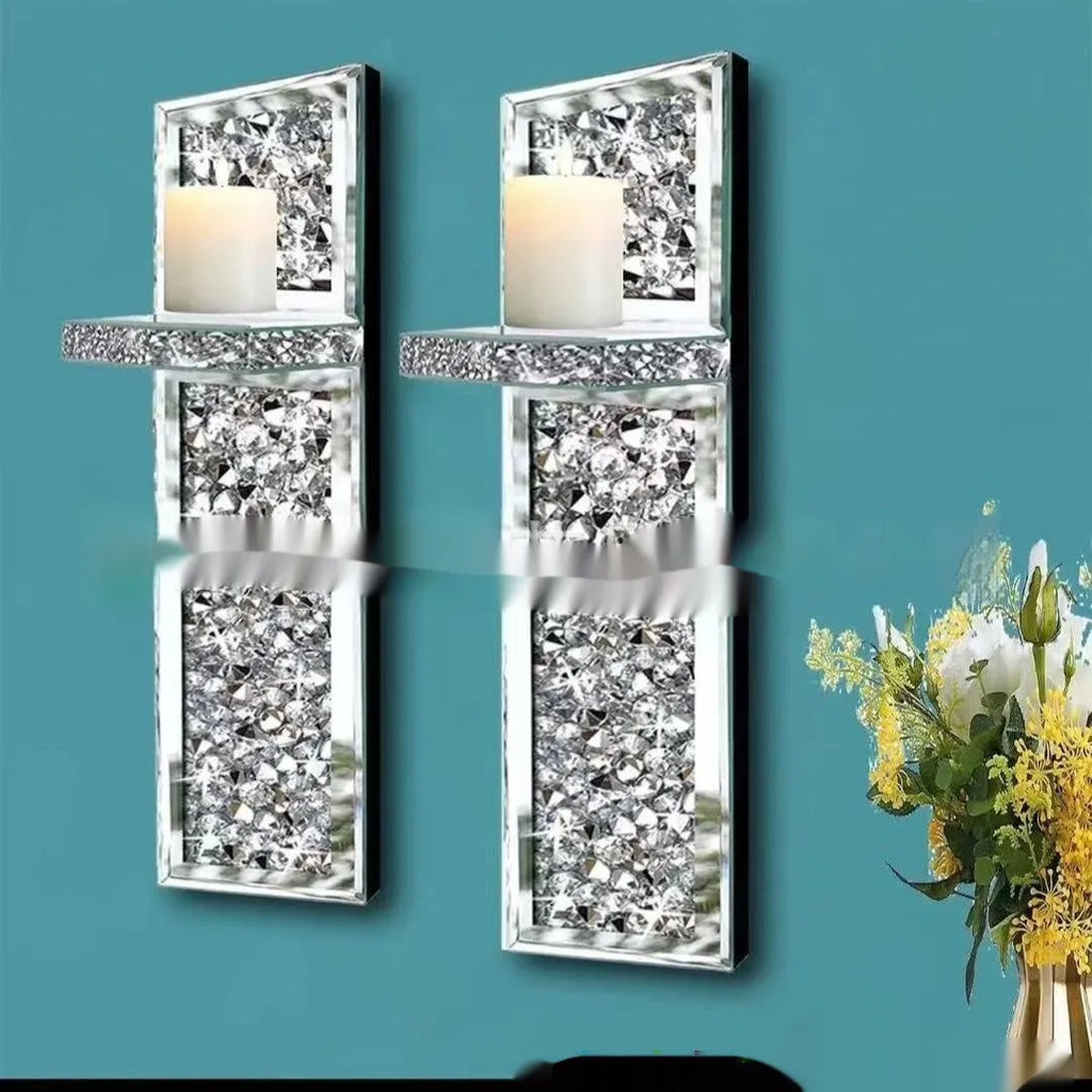 Pair of silver mirror glass wall candle holders measuring 10x11x38cm